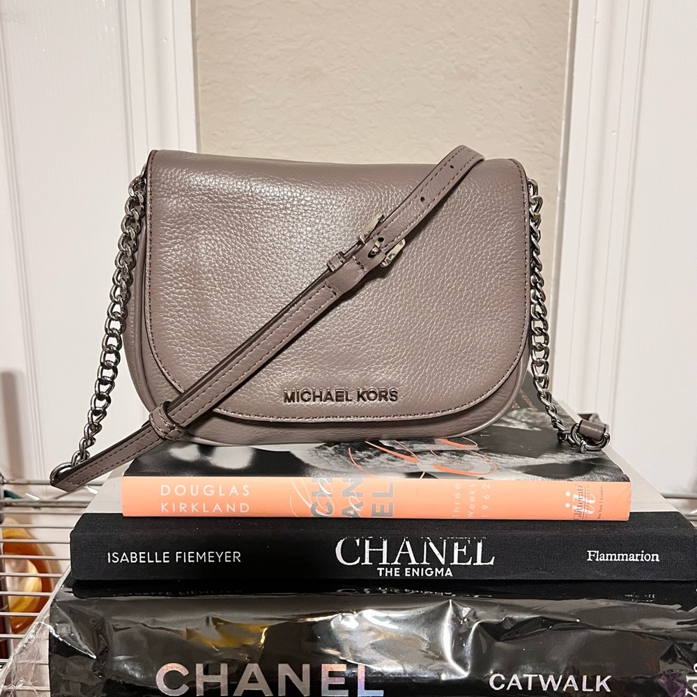 Michael Kors leather crossbody with textured exterior.